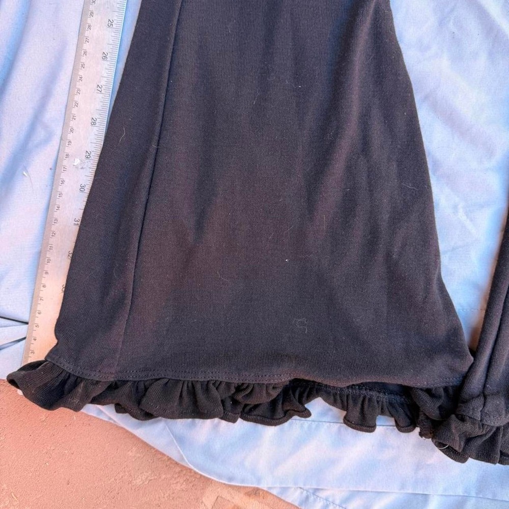 Black flare pants with ruffle hem - Picture 2 of 4